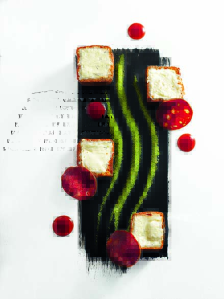 Ossau-Iraty en beignet croquant poussière d’herbes fraîches et chorizo